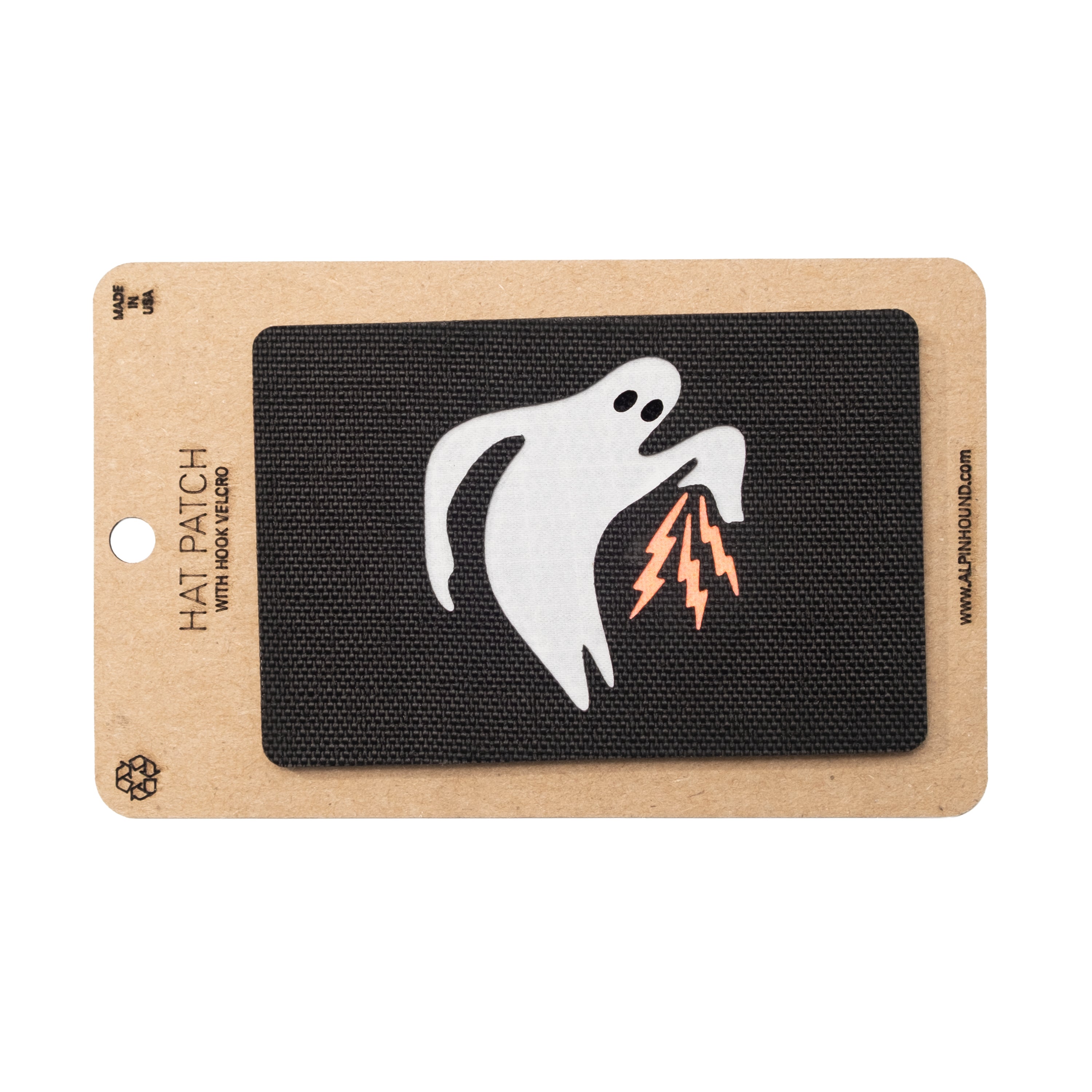 Ghost with lightning bolt patch on a black background with a brown card