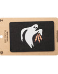 Ghost with lightning bolt patch on a black background with a brown card