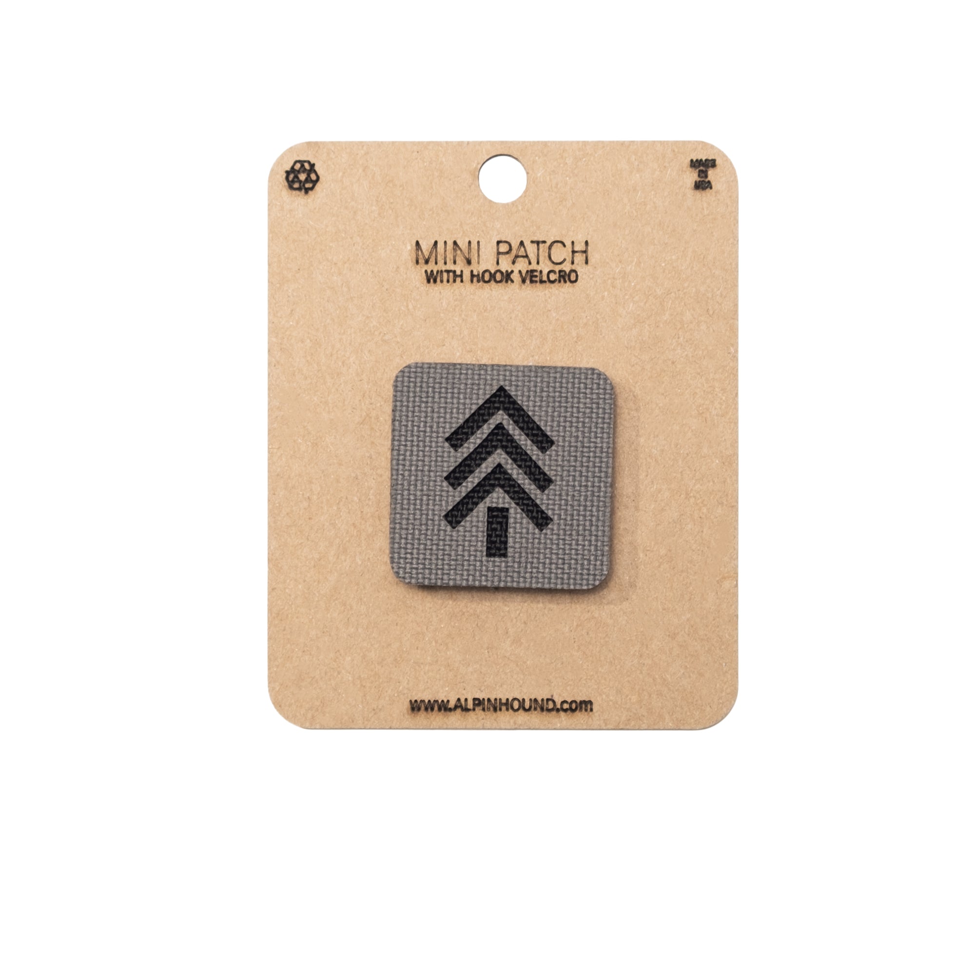 Mini patch with hook and velcro on a cardboard backing with branding information.