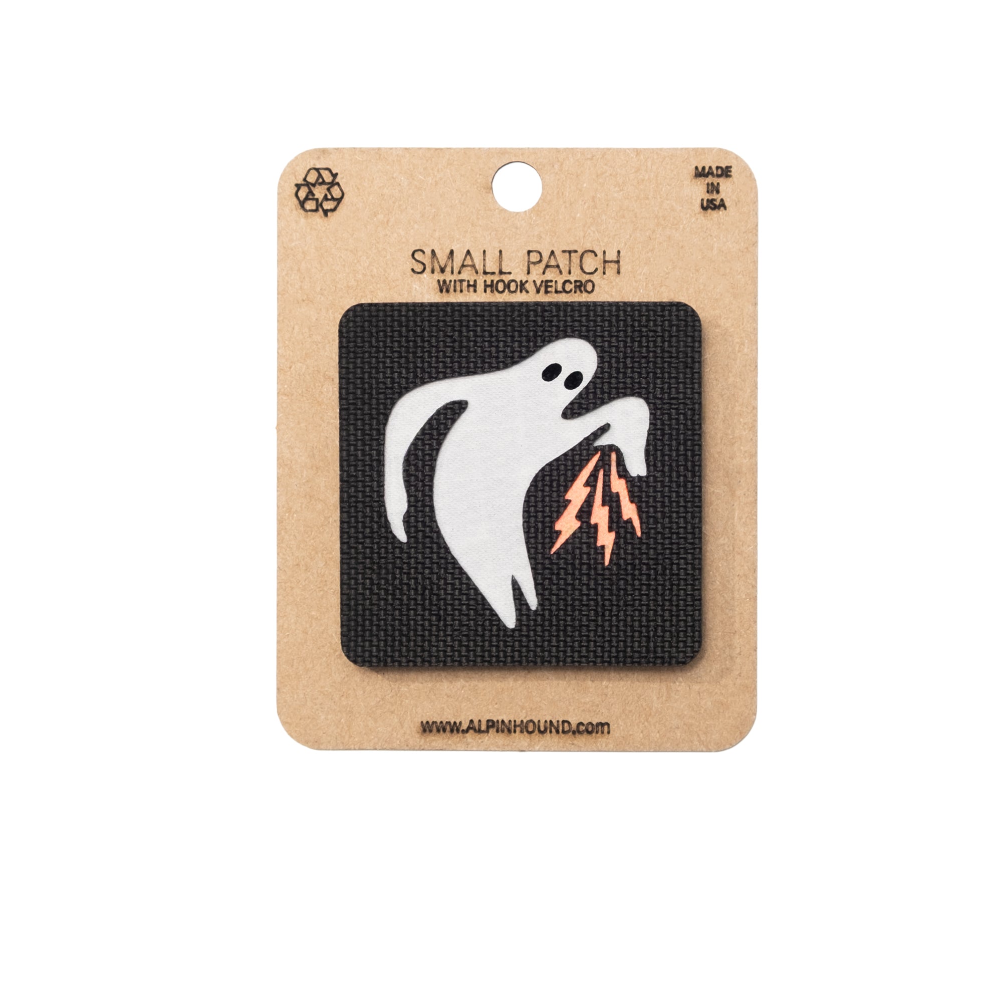 Ghost patch with lightning bolt on a black background, attached to a cardboard backing with 'Alpinhound' branding.