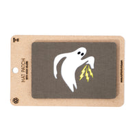 Hat patch with ghost design on a cardboard backing