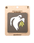 Ghost with lightning bolts patch on a cardboard backing with 'Alpinhound' branding.