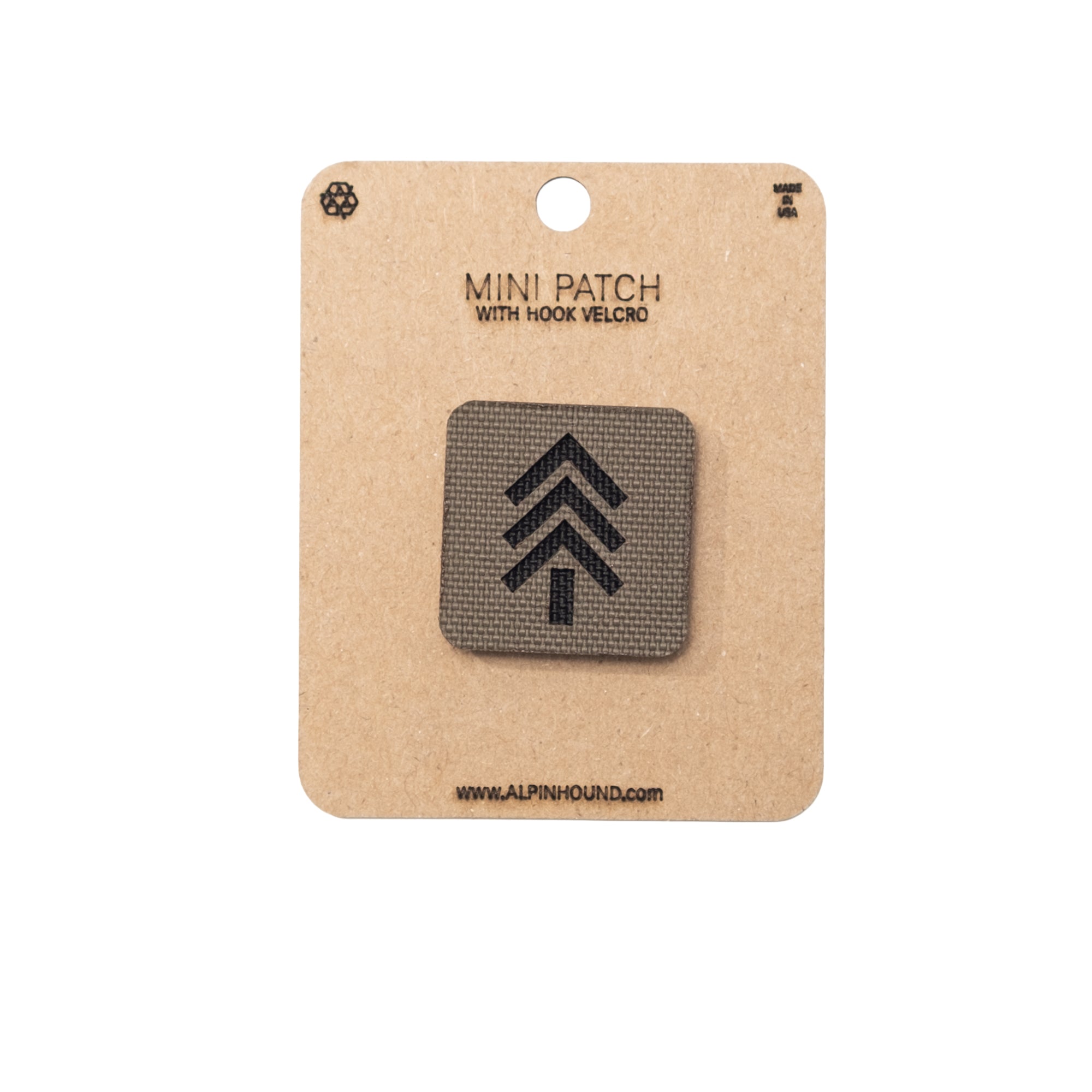 Mini patch with hook and velcro on a cardboard backing with brand name.