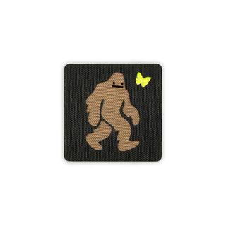 Squatch and butterfly patch 2x2 black coyote solo shot